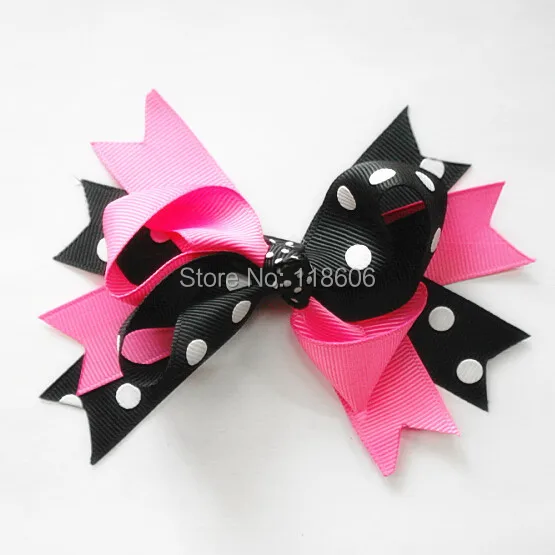 pink and black polka dot twisted bow.jpg