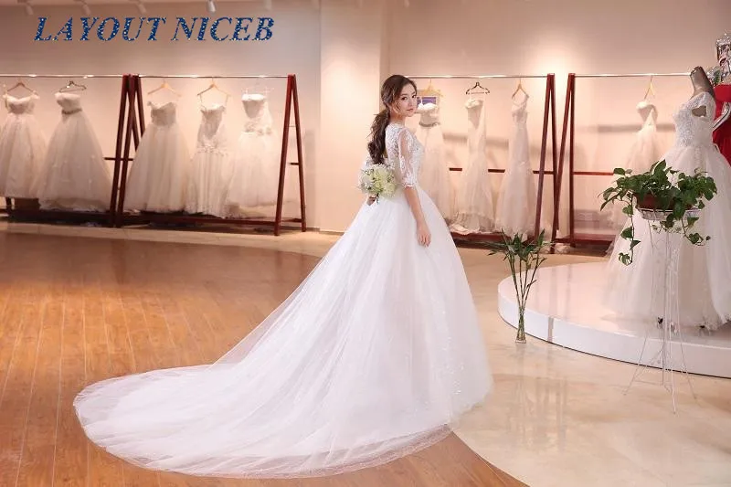 wedding dresses long tail embroidered flower pearl print sequins wedding dress robes de soirée De Mariee Plus