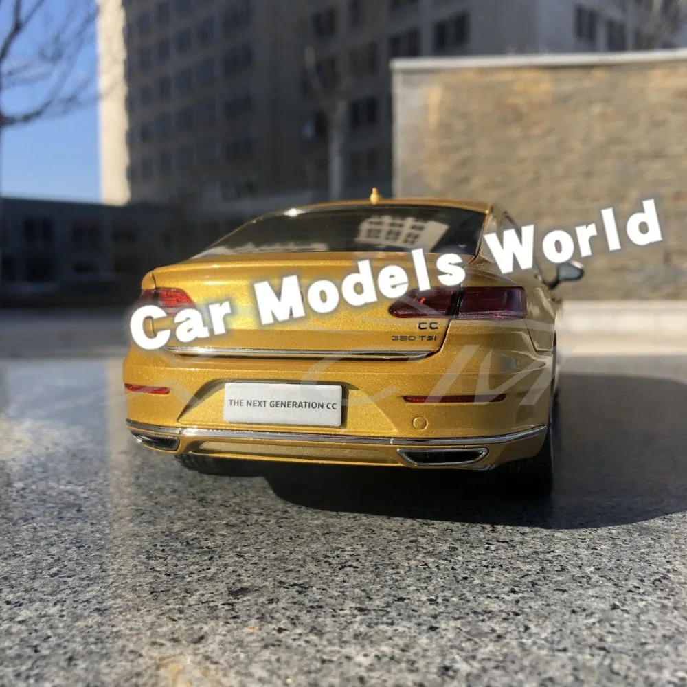 Литая модель автомобиля Arteon для нового поколения C 1:18 (золотой/желтый) + маленький