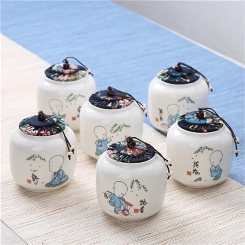 

Jade White Porcelain Tea Jar Ceramic Sealed Tea Box Packing Box Ceramic Tea Jar Kitchen potes de cozinha armazenamento Porcelain