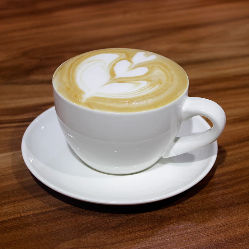 

Hot!! China white porcelain cup home Cafe Simple Ceramic cup coffee set Creative cup saucer spoon Hotel Supplies Free Shipping