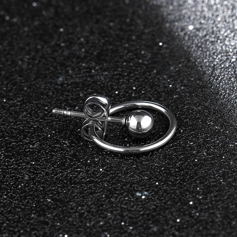 

Idol trainer titanium steel earrings Korean fashion circle earrings men tide earrings female hypoallergenic single