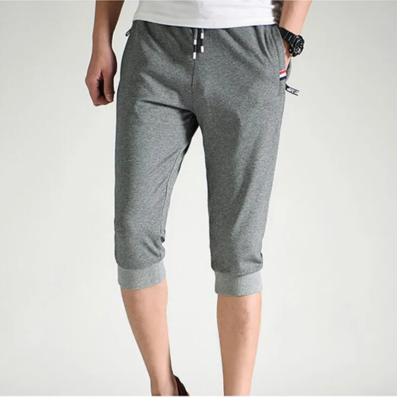 

2019 summer new men's cotton casual pants draw rope stretch sports pants zipper pocket decoration large size S-4XL cropped trous