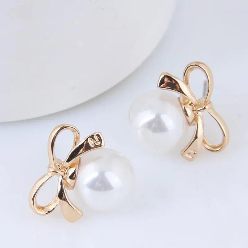 

Xiacaier Women Bow Beads Stud Earrings For Women Piercing Simulated Pearl Flower Earrings Fashion Jewelry Ear Studs Brincos 2019