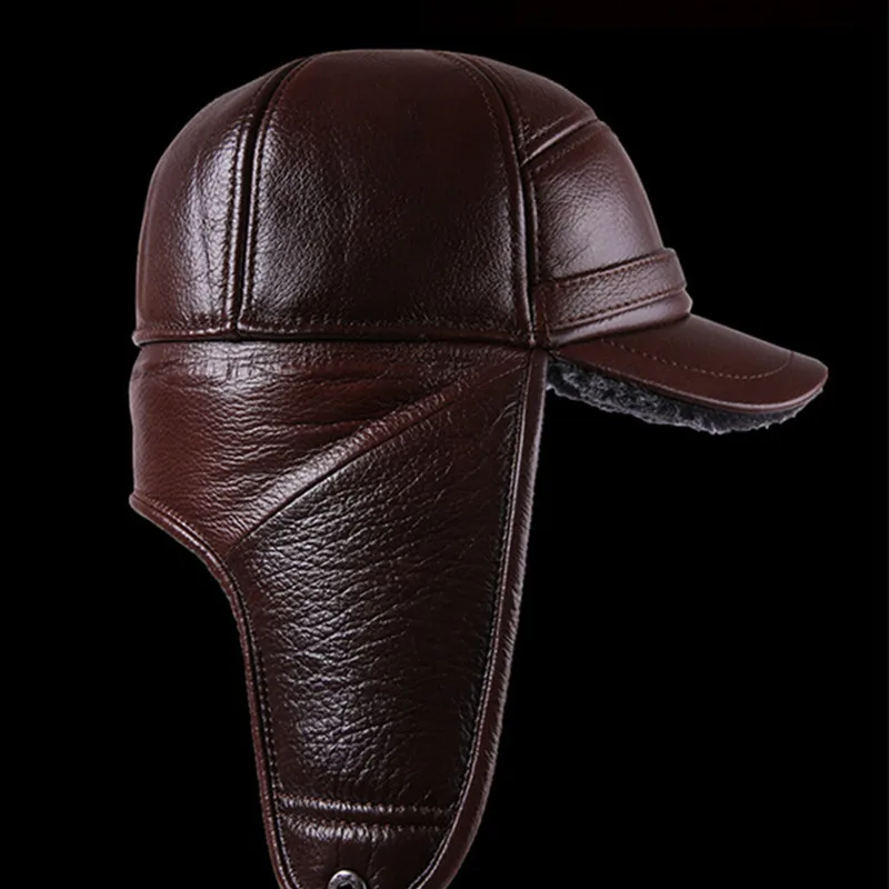 Günstige SILOQIN Neue Winter männer Echte Leder Hut Verdicken Warm Rindsleder Leder Baseball Caps Mit Ohren vati Hüte Hysterese marken Kappe