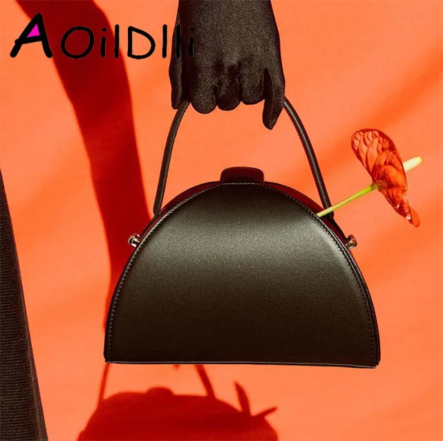 

2018 spring and summer new Turkish small semi-circular handbag personality minimalist shell shoulder diagonal bag female