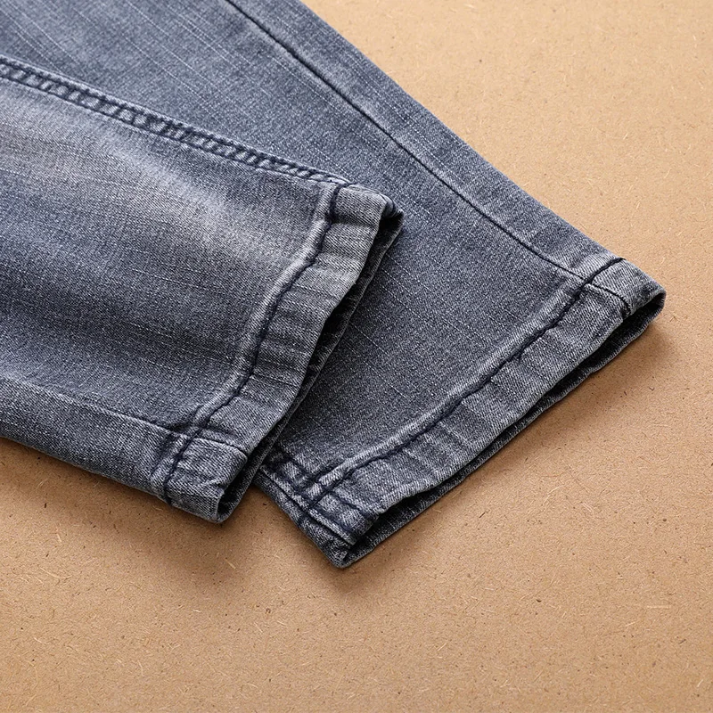 Модные новые мужские джинсовые брюки с вышитыми дырками, мужские повседневные облегающие джинсы с заплатками, прямые поставки