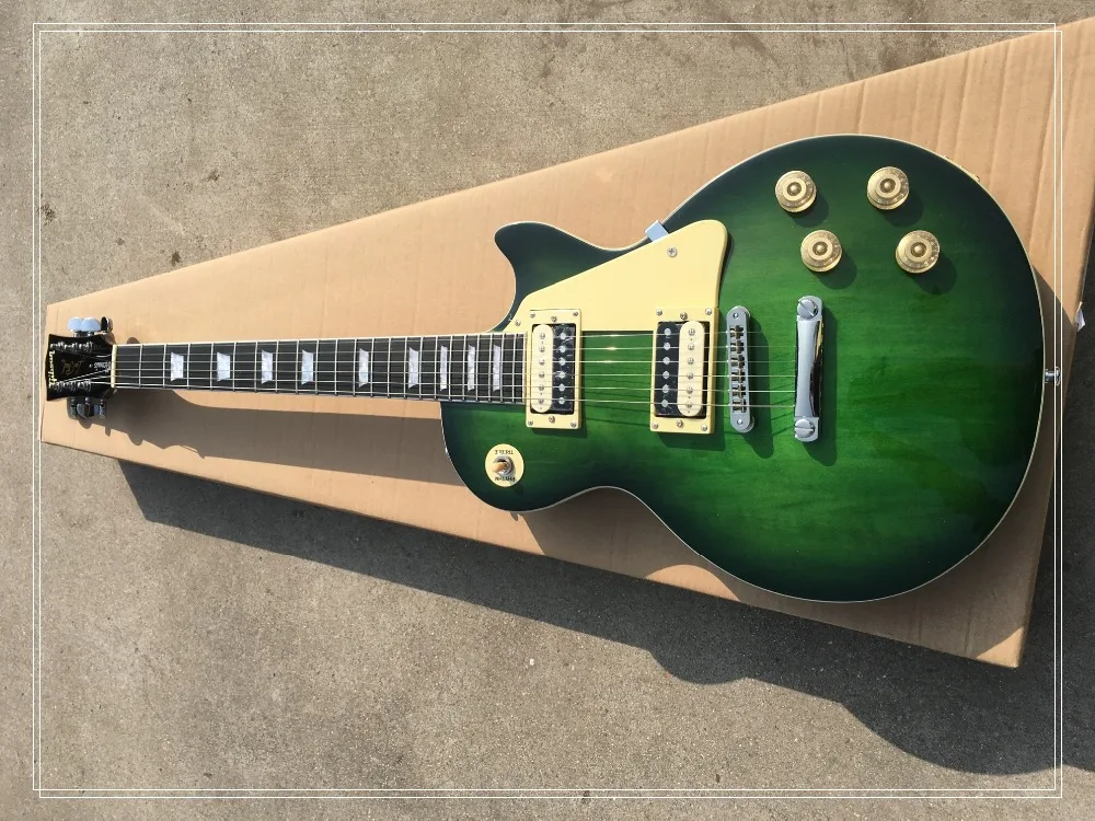 

in stock!!! electric guitar lp rose wood fingerboard green color beautiful and wonderful thank you