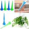Hot! 4PCS Automatic Garden Watering Spike Plant Flower Waterers Bottle Irrigation System Watering Cones Cleaning Garden Tools ► Photo 3/3
