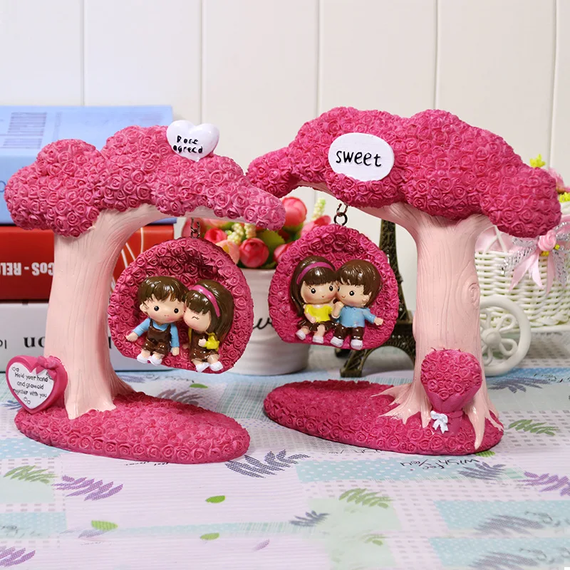 Goedkoop Europa Stijl Liefde Hartvorm Roze Hars Lover Swing Figurine Bruiloft Verjaardag Valentijnsdag Ambachten Gift Sculptuur Home Decor