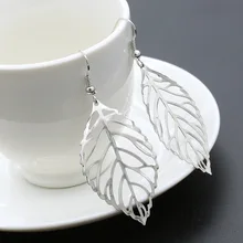 2018 Pendientes Mujer Hot Fashion Wholesale Jewelry Hollow Metal Leaves Dangling Long Statement Drop Earrings For