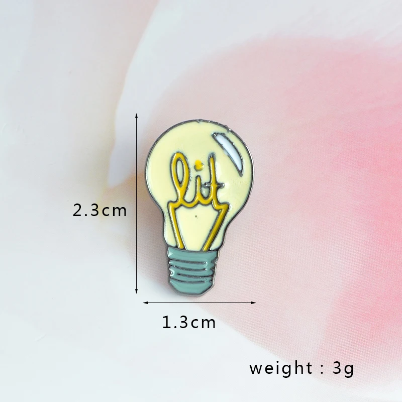 cartoon light bulb brooch