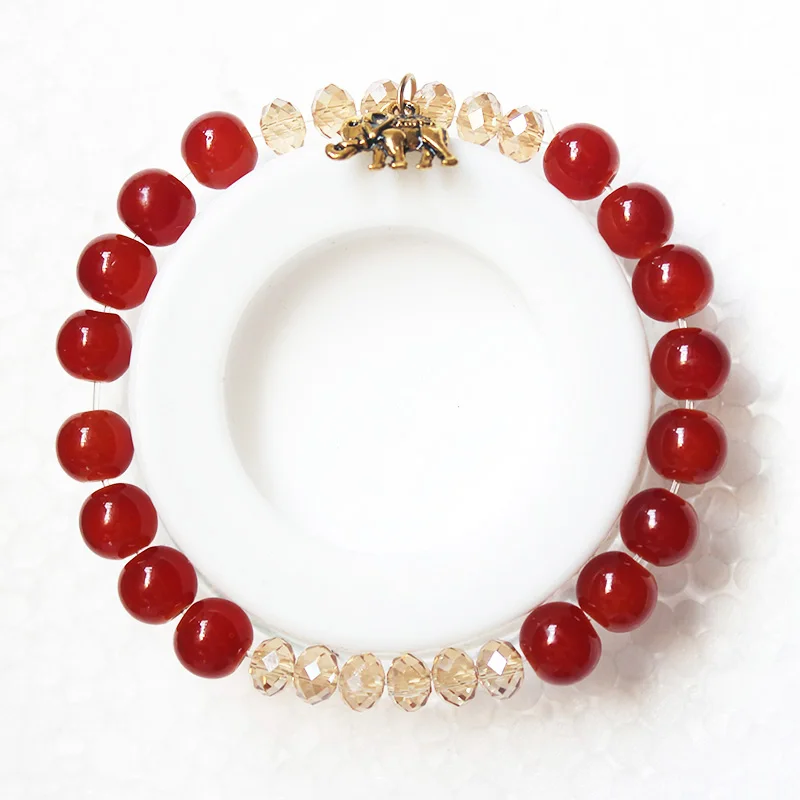 2 elephant red beads