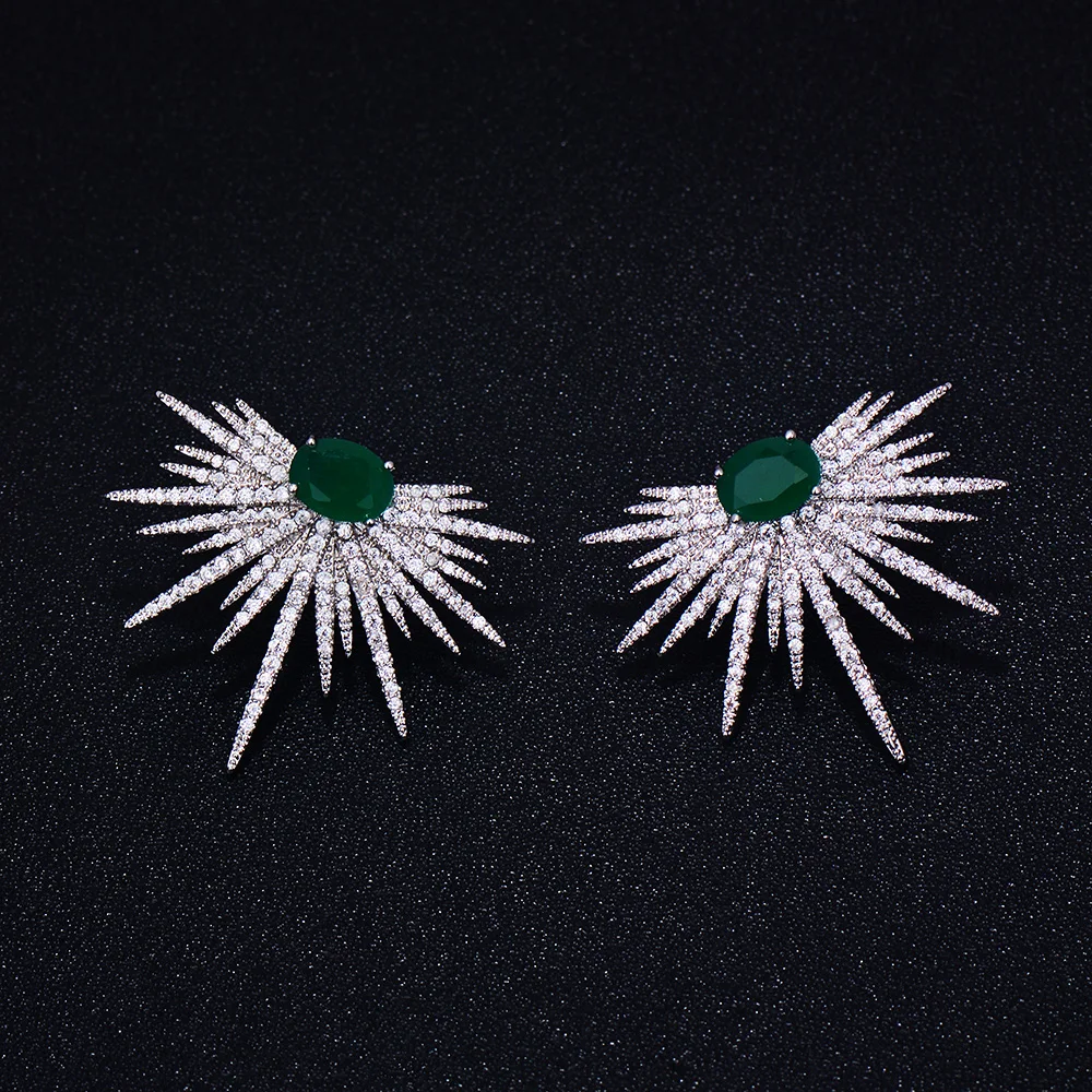 Kopen GODKI Brand New hot Fashion Populaire Luxe Kristal Zirkoon Stud Oorbellen Spark Vorm Bloem Oorbellen Sieraden voor vrouwen