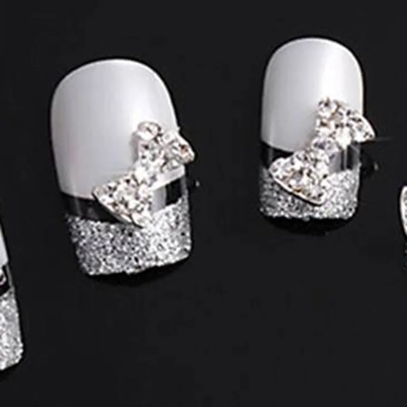 

New 2015 10pcs 3D Clear Alloy Rhinestone Bow Tie Nail Art Slices DIY Decorations Free Shipping