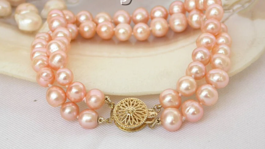 

shippingAuthentic 2row pink freshwater pearl bracelet 5.25