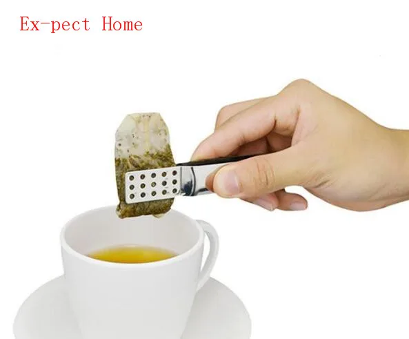 https://ae01.alicdn.com/kf/HTB1njZsRhTpK1RjSZR0q6zEwXXai/100pcs-Stainless-Steel-Tea-Bag-Clip-Anti-hot-Clamp-Tong-Tea-Accessories-Small-Mini-Sugar-Food.jpg