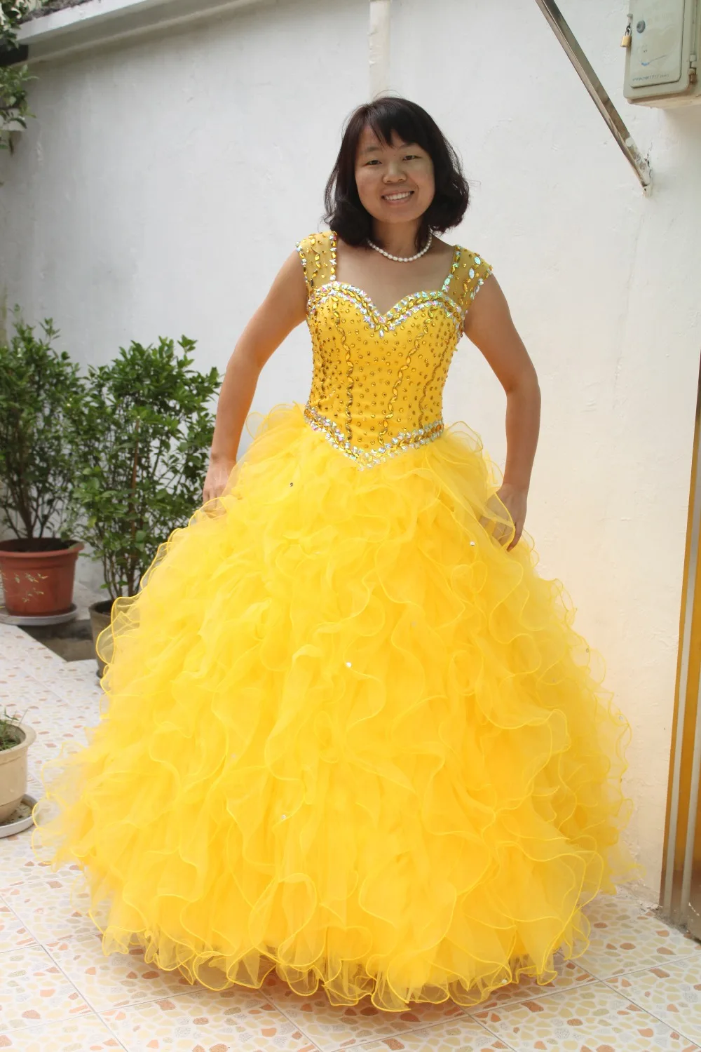 pink with gold quinceanera dress