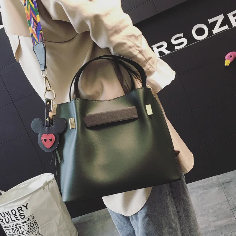 

Women's bag new water bucket bag winter fashion color shoulder strap shoulder bag Korean version of the lovely pendant handbag