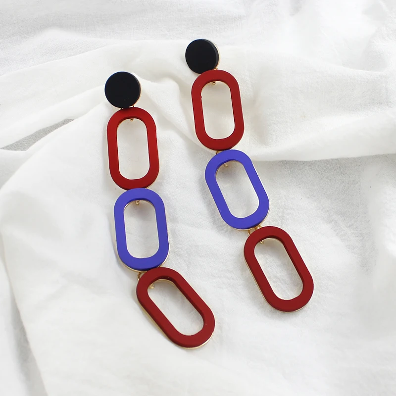 

Colorful geometric hollow oval stitching pendant earrings Simple and stylish personality creative European and American earrings