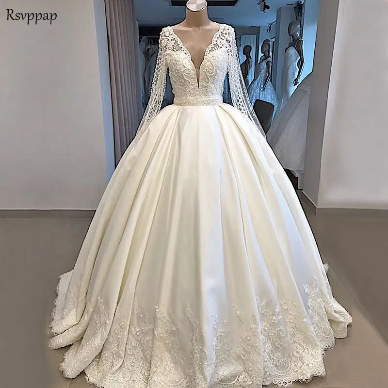 

Luxury Wedding Dresses 2019 Sheer Lace Long Sleeve Sexy Nude Back V-neck Heavy Pearls Ball Gown White Satin Bridal Wedding Gowns