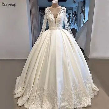 

Luxury Wedding Dresses 2020 Sheer Lace Long Sleeve Sexy Nude Back V-neck Heavy Pearls Ball Gown White Satin Bridal Wedding Gowns