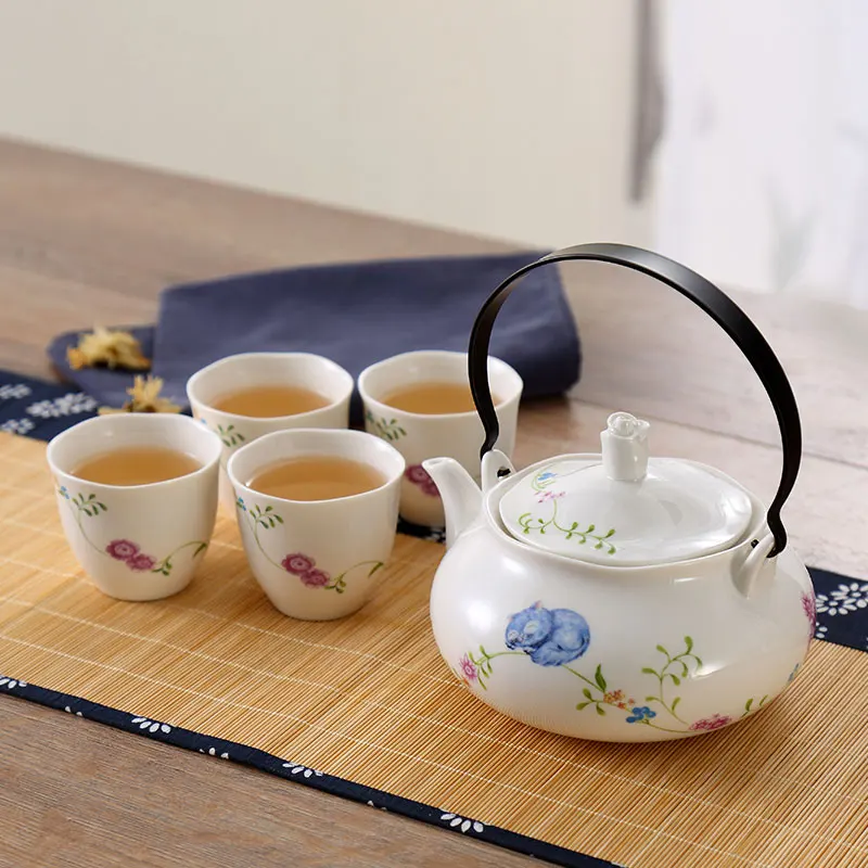 Young girl Japanese style tea set teaware Four cups one teapot Beech