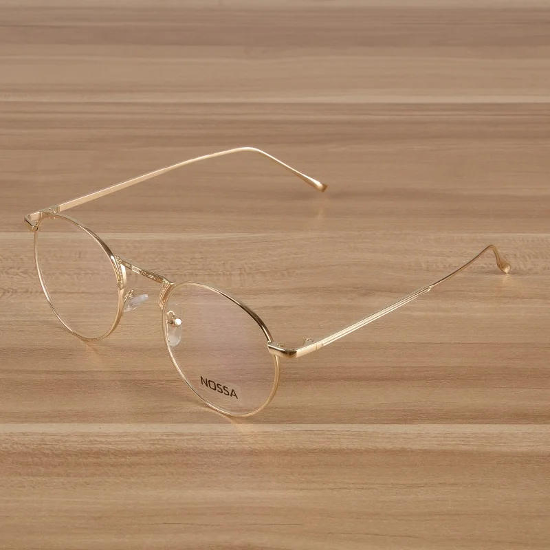 

Retro new fashion round frame metal glasses frame men and women trend decoration flat mirror literary students fine glasses.