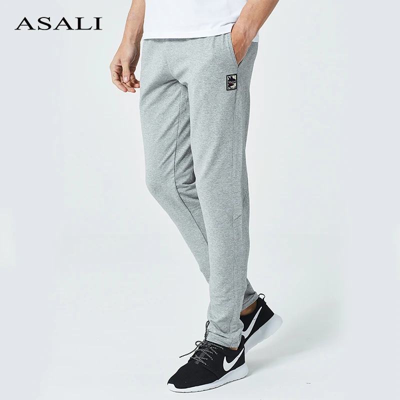 2019 الرجال السراويل الصلبة فضفاض السراويل المرنة القطن صالح سليم بنطلون ركض Sweatpants عارضة الأزياء السراويل الترنك للذكور