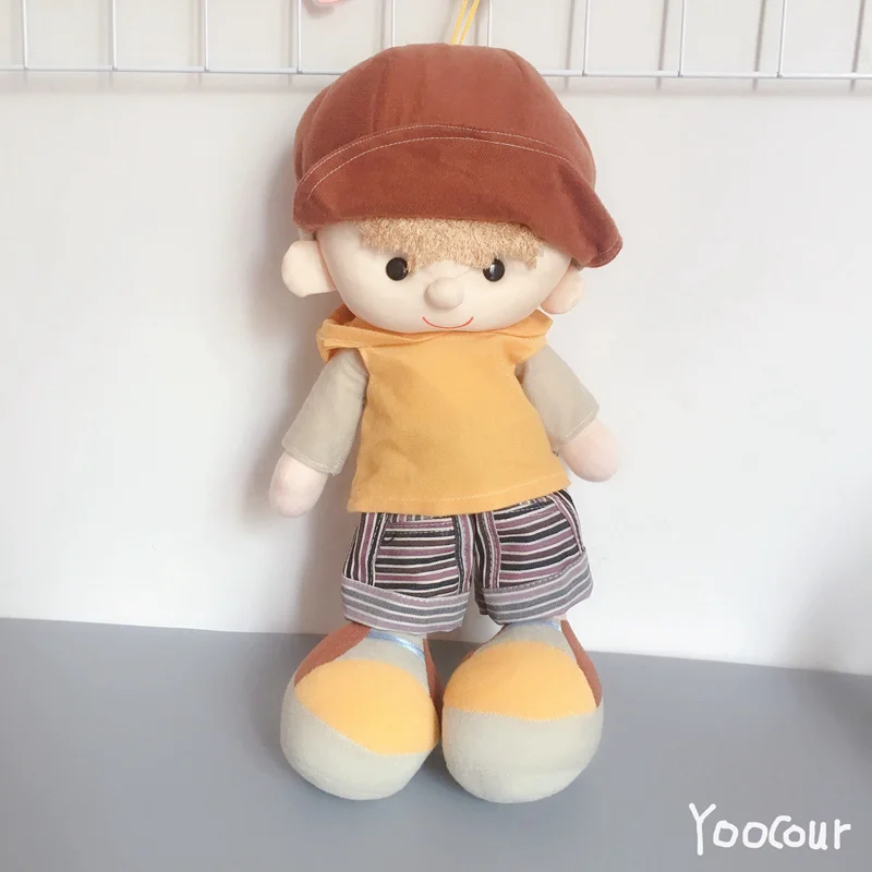 stuffed boy doll