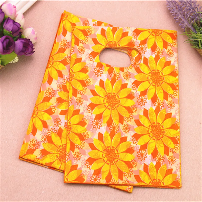 

New Design Wholesale 100pcs/lot 15*20cm Yellow Sunflower Gift Packaging Bags With Handles Plastic Shopping Gift Bags