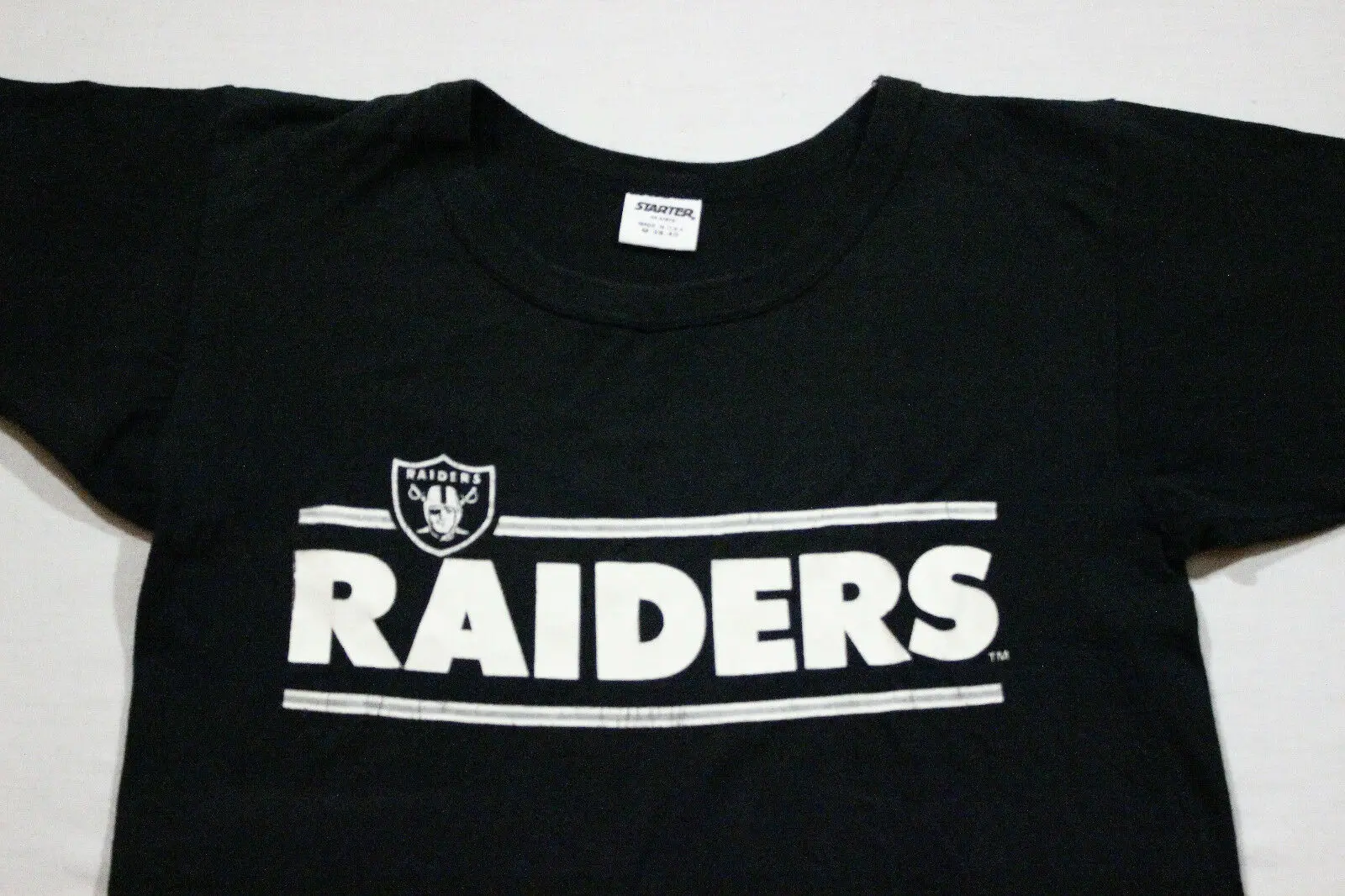

Sz M Vtg 80's LA RAIDERS STARTER Spellout Oakland NWA OG USA Rap Ringer T-Shirt