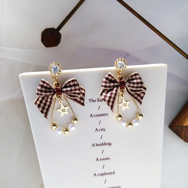 

English student bowknot Clip on earrings Trendy wild metal texture five-pointed pearl ear clip clip on earrings no pierced