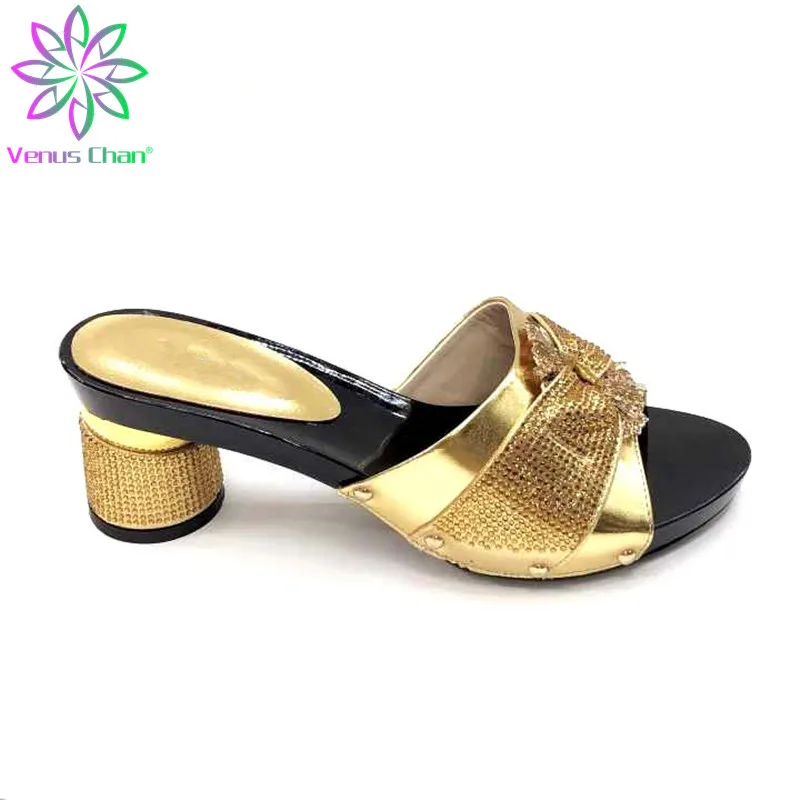 gold sandals and bag