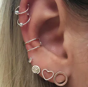 

new 7 pcs/lot Vintage alloy Stud Earrings Ear clip Set for Women Lovely Charms Collection Heart-shaped Circles Rotating Jewelry