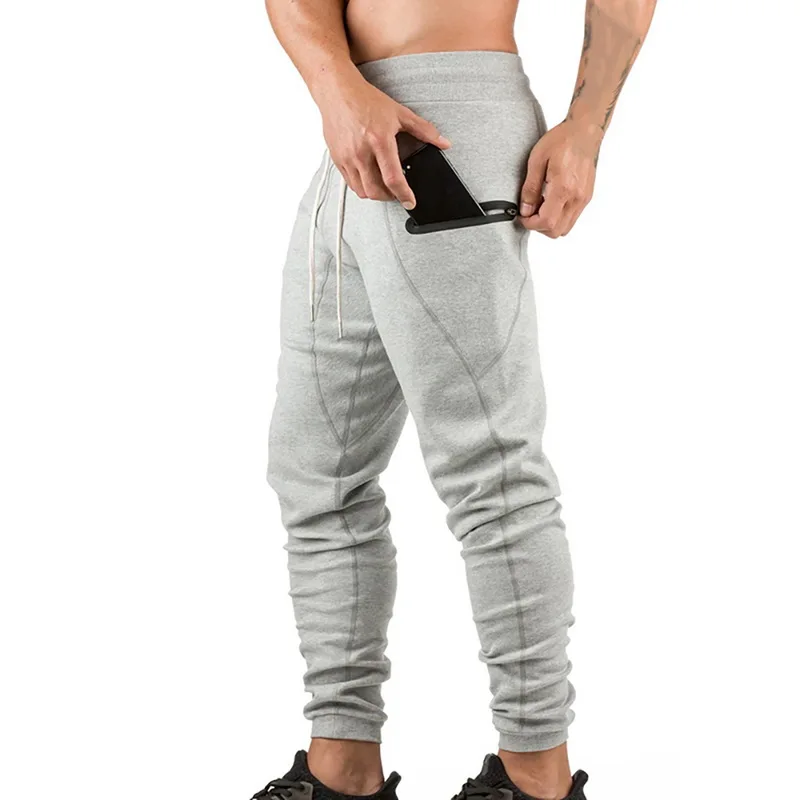 

MJARTORIA Men Solid Slim Fit Drawstring Jogger Pants Casual Sweatpants Zipper Pocket Trousers Fitness Gym pantalones hombre