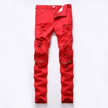 red cut up jeans