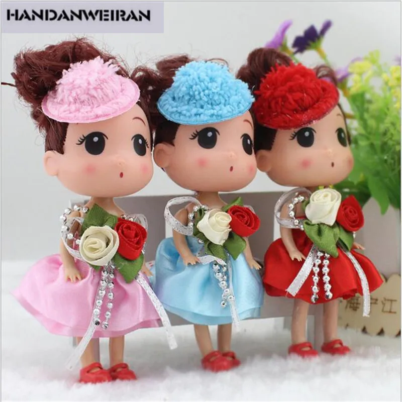 

HANDANWEIRAN 2019 NEW 1PCS 12cm cute mini silicone girl doll toy cake doll pendant soft toys for girl christmas gift