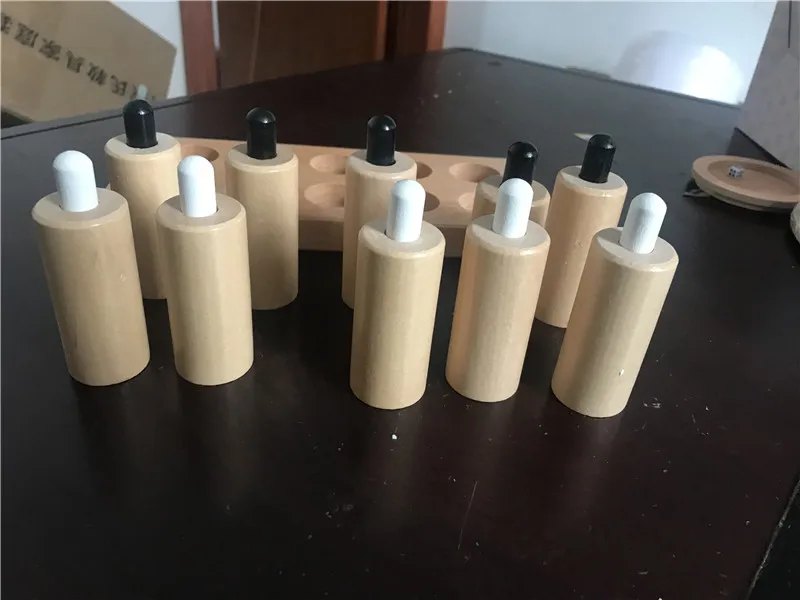 New Wooden Baby Toy Montessori Pressure Cylinders Sensorial Early Childhood Education Preschool Kids Toys Baby Gifts New Wooden Baby Toy Montessori Pressure Cylinders Sensorial Early Childhood Education Preschool Kids Toys Baby Gifts