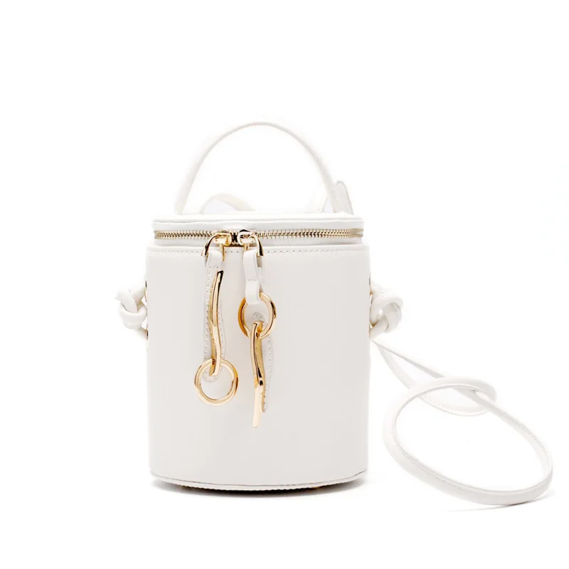 

Retrospective round box bag spring summer new bucket bag hand-held single shoulder slanted leather bag mini bucket bag