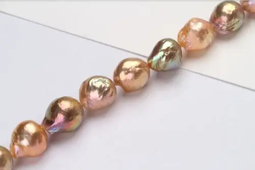

A huge14-15mm south sea gold pink purple pearl bracelet7.5-8''