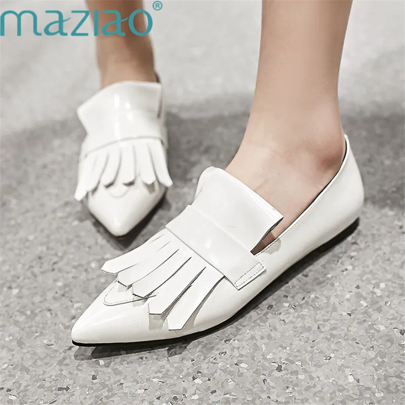 pointed toe flats with tassels