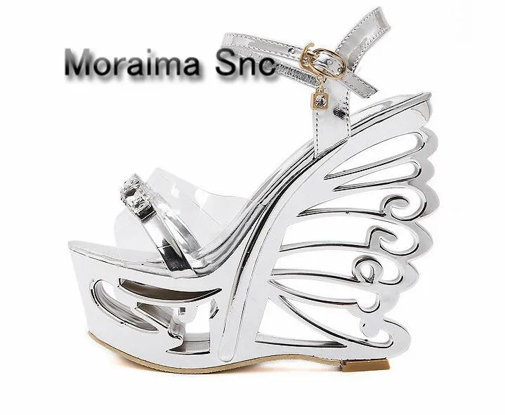 

Moraima Snc Luxury design gold sliver butterfly fretwork heels shoes women gladiator platform strange style high heels sandals
