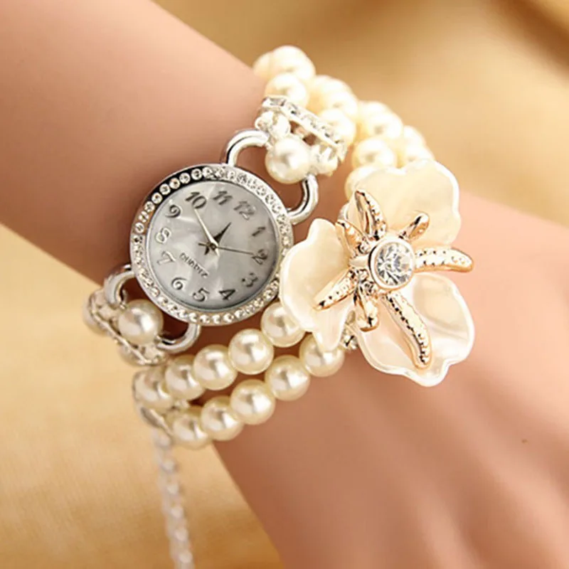 

2018 Hot Sell Clover Female Models Fashion Flower Pearl Watch Bracelet Personality Winding Table Fashion Style Quartz-watches