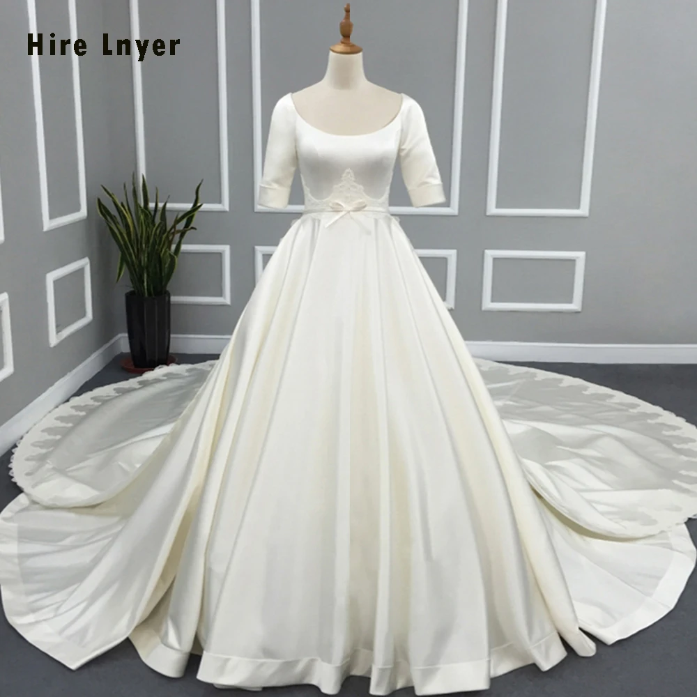 

Hire Lnyer New Special Half Sleeve Button Up Chapel Train Gorgeous Bridal Dresses Robe Mariage Lace France Satin Wedding Gowns