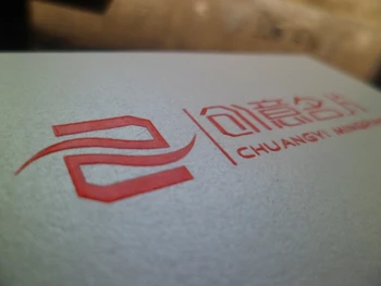 

Paper Business card with uv coating on one side