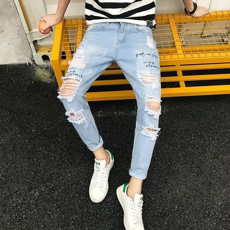 Spring and Summer New Pierced Jeans Men's Loose Straight Cylinder Leisure Korean Edition Fashion Student Beggars Nine Points Pan Spring and Summer New Pierced Jeans Men's Loose Straight Cylinder Leisure Korean Edition Fashion Student Beggars Nine Points Pan