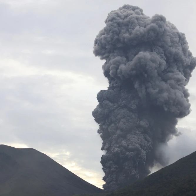 Ash cloud rising from Tompaluan crater at Lokon-Empung volcano  Indonesia Poster Print (34 x 22)