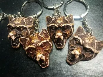 

Free Shipping yqtdmy newest newest 12 pcs Handmade Carved Tibetan Devil Totem Rock Keychain