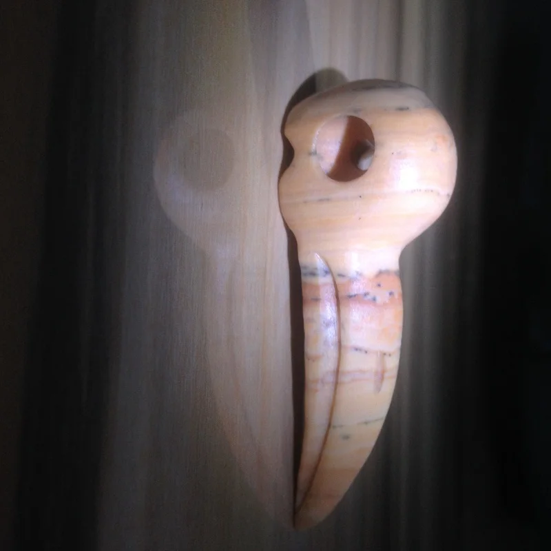 

12g of natural quartz crystal carved wood fossil skull pendant crows